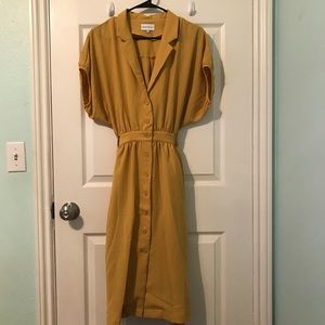 J.O.A. x Chriselle Lim Trench Dress in Mustard